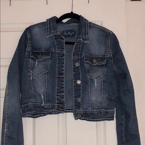 Stressed, cropped denim jacket